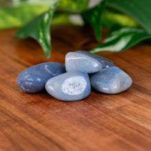 Load image into Gallery viewer, Blue Quartz Tumbled on a wooden surface - Down to Earth 
