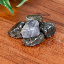 Load image into Gallery viewer, Labradorite Tumbled on a wooden surface high angle - Down to Earth 
