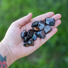 Load image into Gallery viewer, Tumbled Blue Tigers Eye in the Palm of a Hand - Down To Earth
