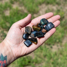 Load image into Gallery viewer, Tumbled Blue Tigers Eye in the Palm of a Hand - Down To Earth
