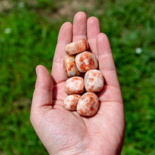 Load image into Gallery viewer, Tumbled Sunstone in the Palm of a Hand - Down To Earth
