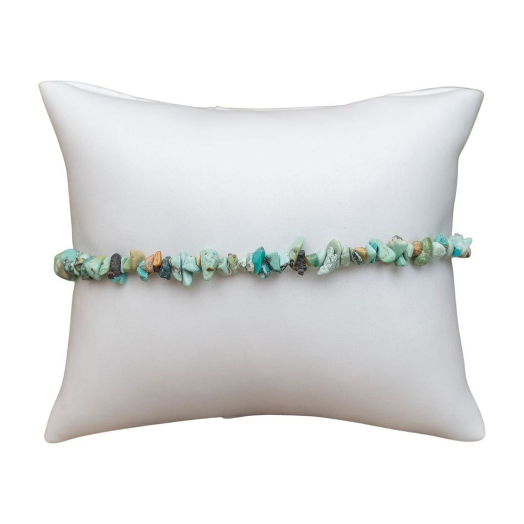 Crystal Chip Bracelet Turquoise on white pillow - Down To Earth