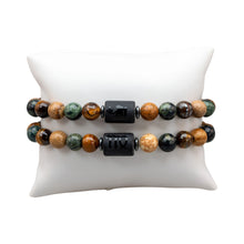 Load image into Gallery viewer, "Two Virgo Zodiac Bracelets on a white pillow," - Down to Earth.
