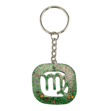 Load image into Gallery viewer, Virgo Glitter Resin Keychain on a white background - Down To Earth
