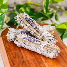 Load image into Gallery viewer, White Sage with Lavender Smudge Stick on a wooden surface - Down to Earth 
