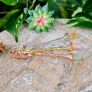 Witch Herb Spoon with Crystal on a wooden surface styled photo - Down to Earth