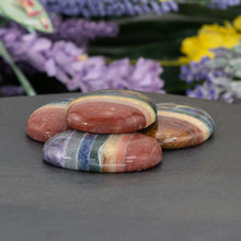 Load image into Gallery viewer, Chakra Worry Stone in a styled photo - Down to Earth 
