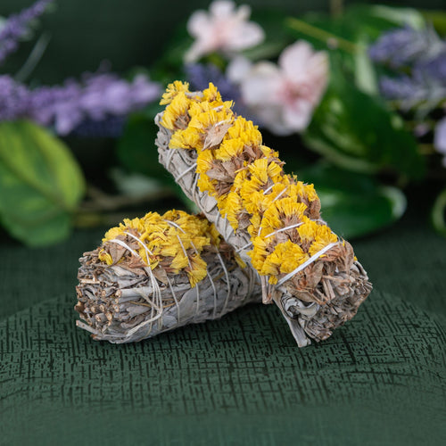 Sage with yellow flowers on a green background - Down to Earth 