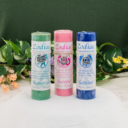 Three zodiac-themed candles, Aquarius, Scorpio, and Gemini - Down To Earth