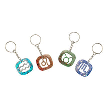 Load image into Gallery viewer, Glitter Resin Zodiac Keychain Group Photo on a white background - Down To Earth
