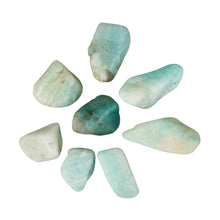 Load image into Gallery viewer, &quot;Eight tumbled amazonite crystals against a white background,&quot; - Down to Earth.
