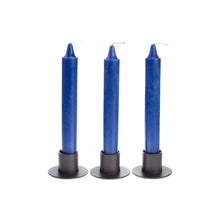 Load image into Gallery viewer, Picture of three blue ritual candles in black candle holders. - Down to Earth.

