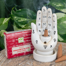 Load image into Gallery viewer, &quot;Single package of Satya Dragon&#39;s Blood Dhoop Cones next to a Palmistry Incense Burner,&quot; - Down to Earth.
