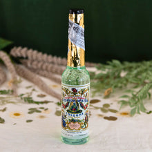 Load image into Gallery viewer, &quot;A single bottle of Murray &amp; Lanman Flordia Water with a floral background,&quot; - Down to Earth.
