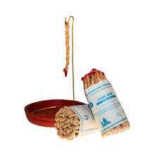 Load image into Gallery viewer, &quot;Two bundle of Frankincense Rope Incense leans against a rope incense burner.&quot; - Down to Earth.
