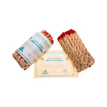 Load image into Gallery viewer, &quot;A studio photograph of two bundles of Frankincense Rope Incense: One without the paper packaging, and one with. This product is hand-rolled in Nepal.&quot; - Down to Earth.
