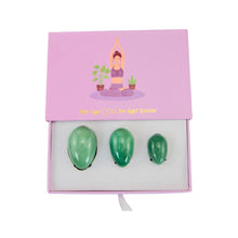 Load image into Gallery viewer, &quot;Top-down view of an ajar green aventurine yoni egg set,&quot; - Down to Earth.
