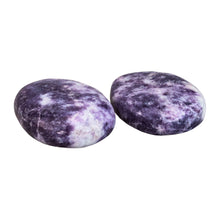 Load image into Gallery viewer, &quot;Side angle of two large lepidolite palm stones against a white background,&quot; - Down to Earth.
