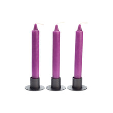 Load image into Gallery viewer, Photograph of three purple ritual candles in black metal candle holders. - Down to Earth.
