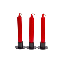 Load image into Gallery viewer, Photograph of three red ritual candles. They are all in black metal candle holders. - Down to Earth.
