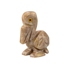 Load image into Gallery viewer, &quot;Side view of a miniature stone sculpture in the shape of a pelican,&quot; - Down to Earth.
