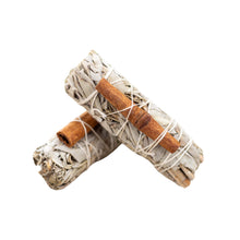 Load image into Gallery viewer, A smudge stick made of white sage and cinnamon, tied with string.

